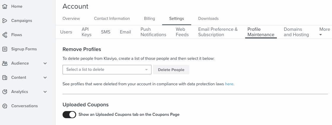 In your Klaviyo account settings, the profile maintenance tab with the switch for uploaded coupons toggled on.