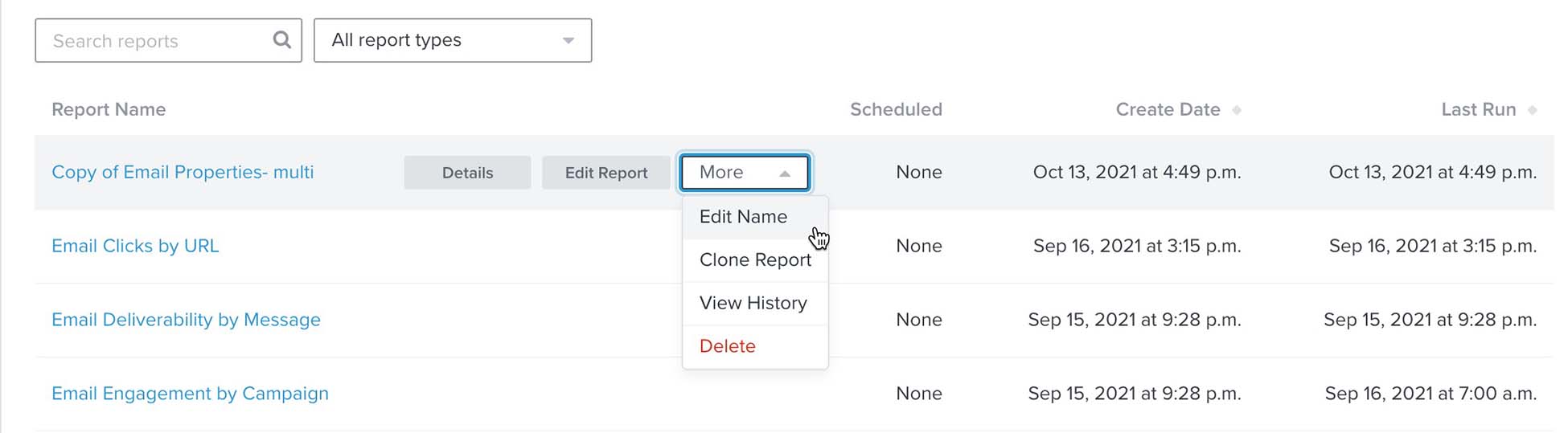 Inside reports view with more dropdown opened from top menu and edit name chosen