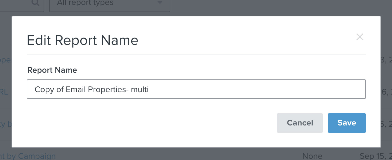 Modal Edit report name (Editar nome do relatório) com campo para o nome do relatório e botão Save (Salvar) abaixo