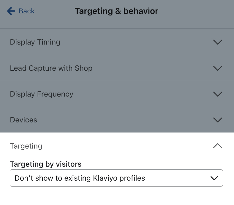 El Targeting by visitor para un formulario de registro de ejemplo configurado como Don't show to existing Klaviyo profiles.