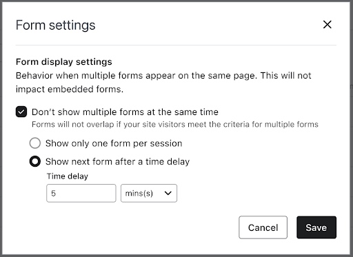 The form settings modal with Don't show multiple forms at the same time selected and Show next form after a 5 second time delay selected. 