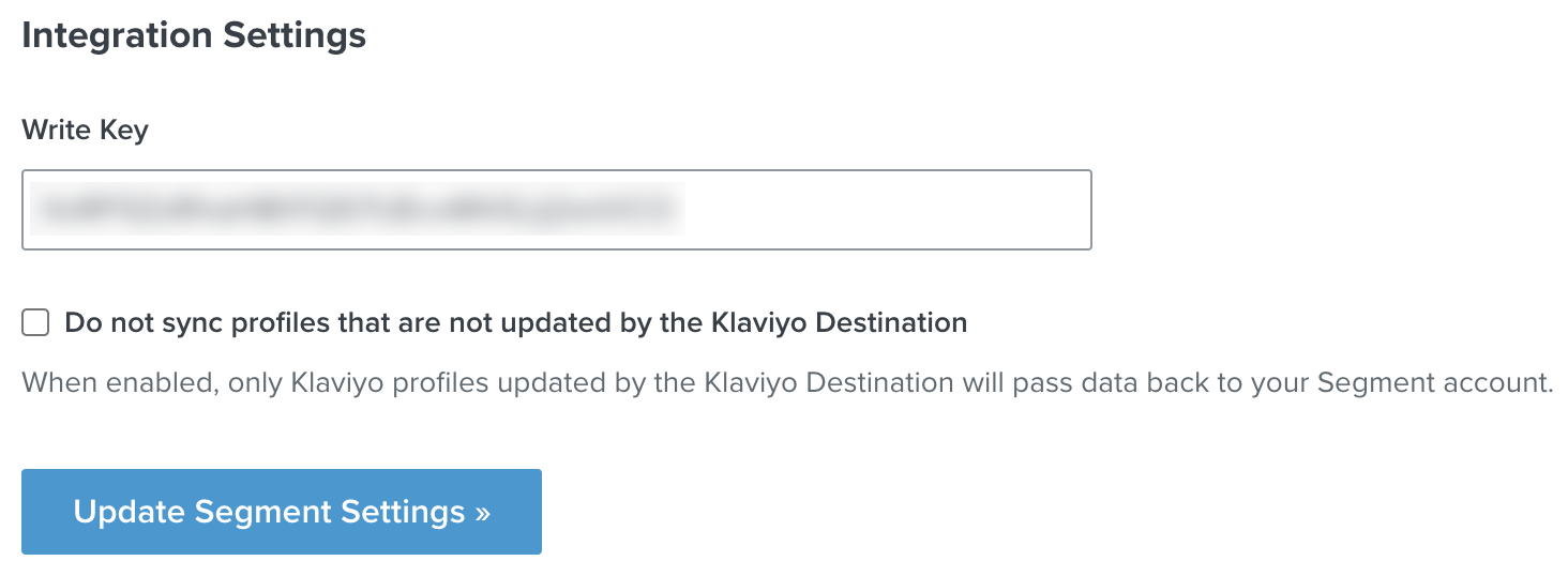 Blurred out write key pasted into Segment integration in Klaviyo, with unselected checkbox below and the button Update Segment Settings at the bottom